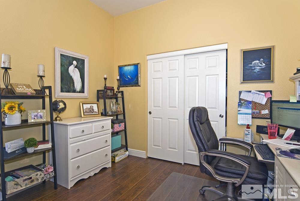 1795 Arrow Wood Court Reno, NV 89521 - Photo 26 of 40 a view of a workspace with furniture and a window
