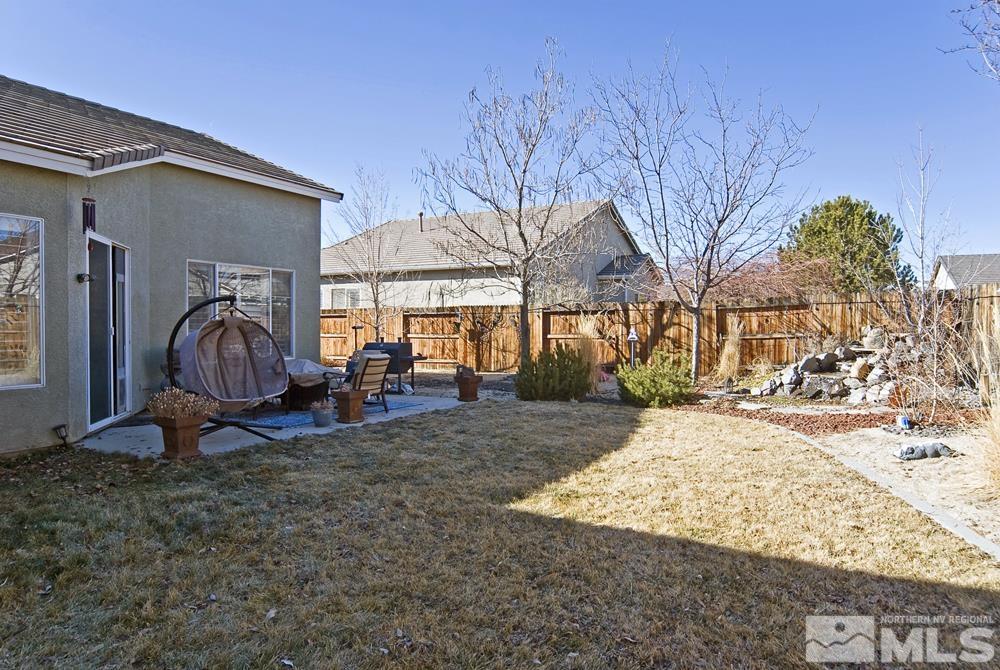 1795 Arrow Wood Court Reno, NV 89521 - Photo 28 of 40 a view of yard with wooden fence