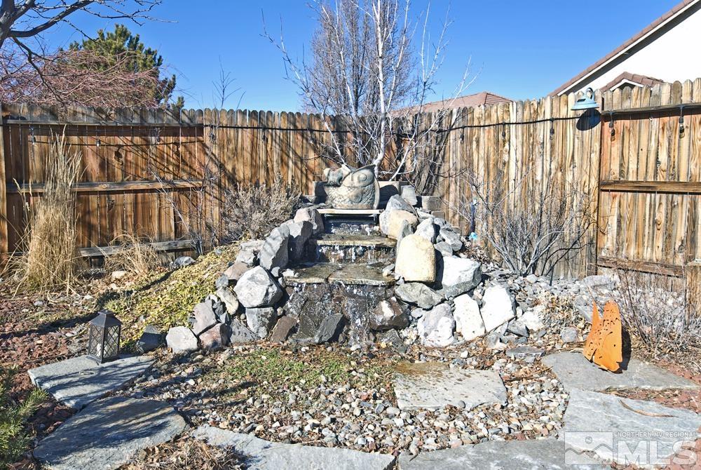 1795 Arrow Wood Court Reno, NV 89521 - Photo 30 of 40 a view of outdoor space with wooden fence