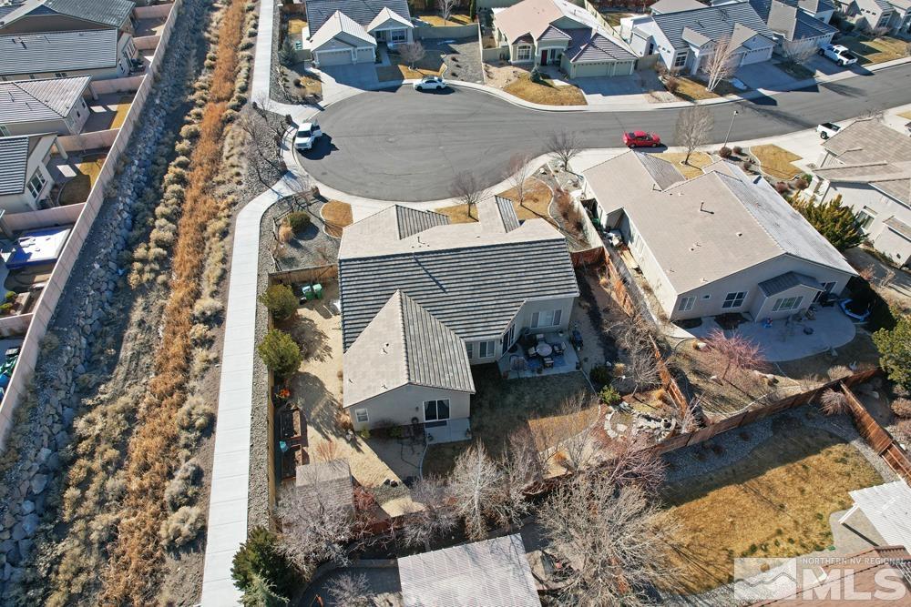 1795 Arrow Wood Court Reno, NV 89521 - Photo 3 of 40 an aerial view of a house with garden space and sitting area
