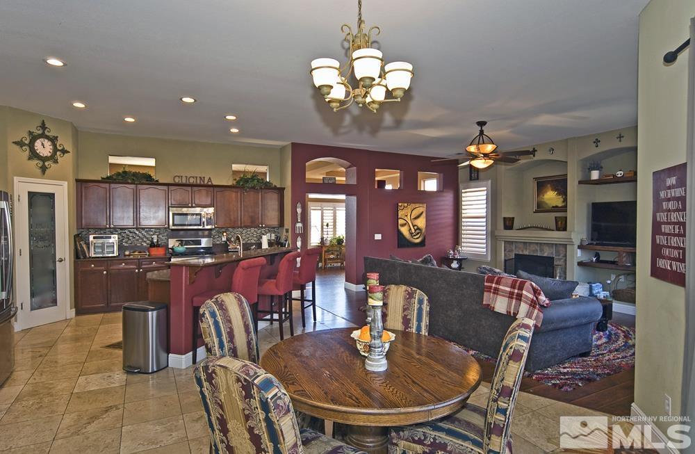 1795 Arrow Wood Court Reno, NV 89521 - Photo 7 of 40 a view of a dining room with furniture