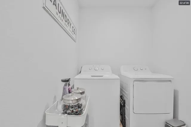 a utility room with dryer and washer