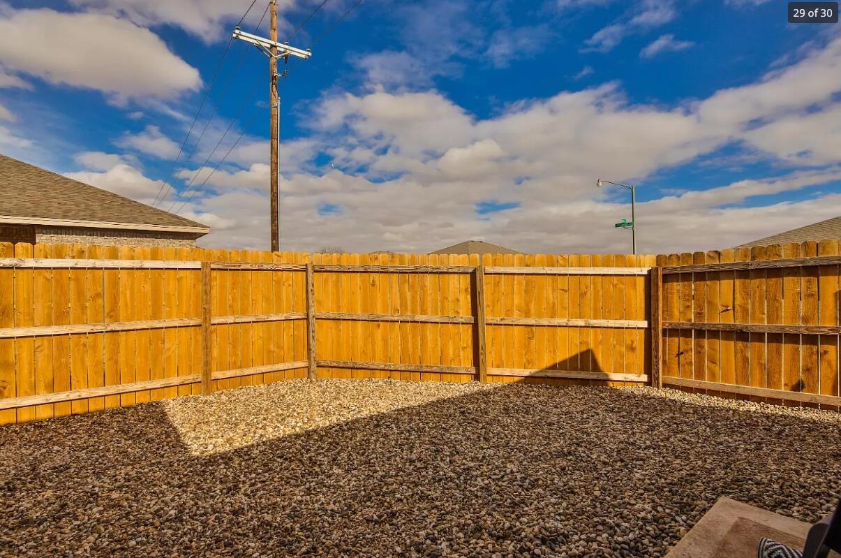 5502 Jarvis Street, Unit B Lubbock, TX 79416 - Photo 13 of 13 a view of a backyard
