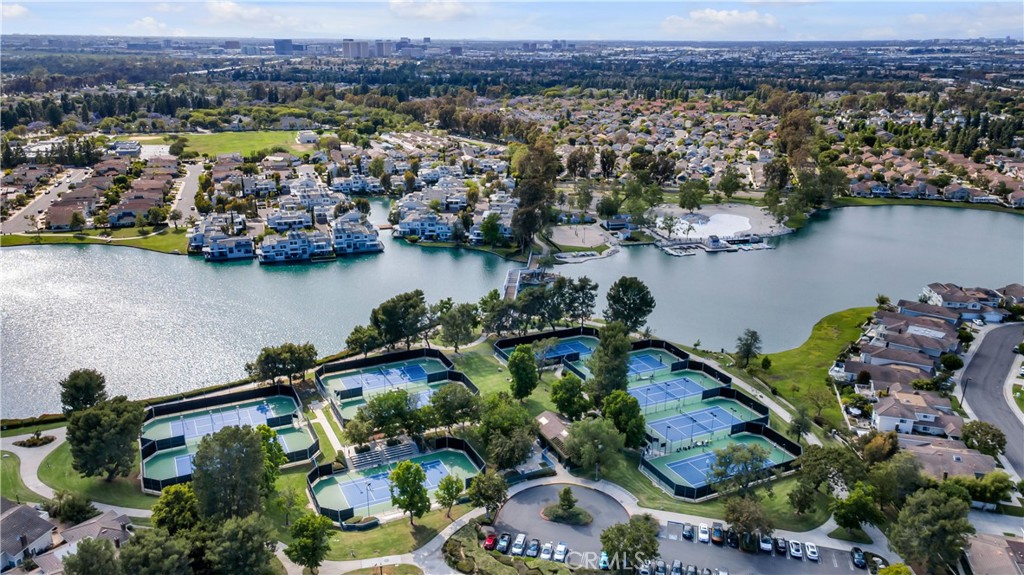 336 Fallingstar Irvine, CA 92614 - Photo 67 of 73 an aerial view of a city with lots of residential buildings lake and ocean view