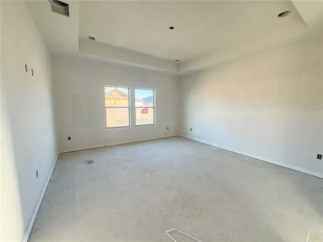 an empty room with a natural light