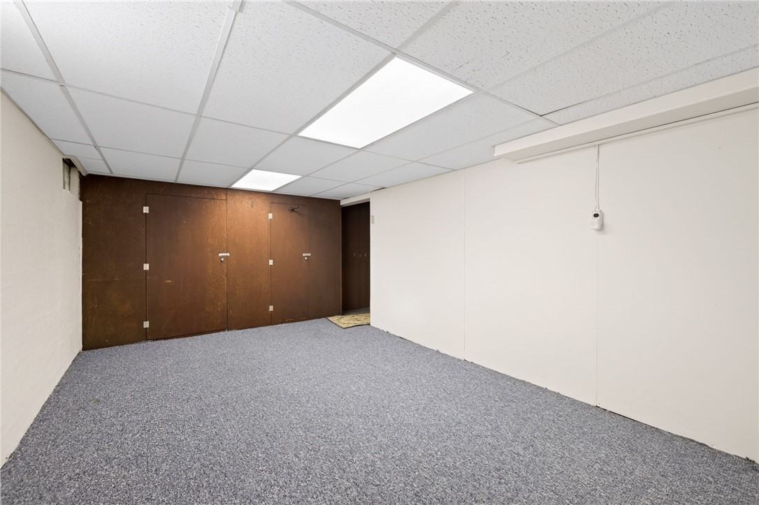 149 Yorkshire Road Irondequoit, NY 14609 - Photo 19 of 22 partially finished basement with cedar lined closet