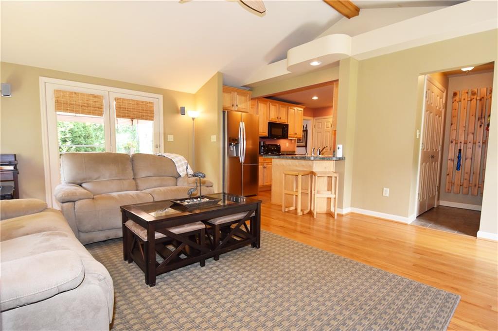 294 Old Farm Road Pittsburgh, PA 15228 - Photo 12 of 25 a living room with furniture and wooden floor