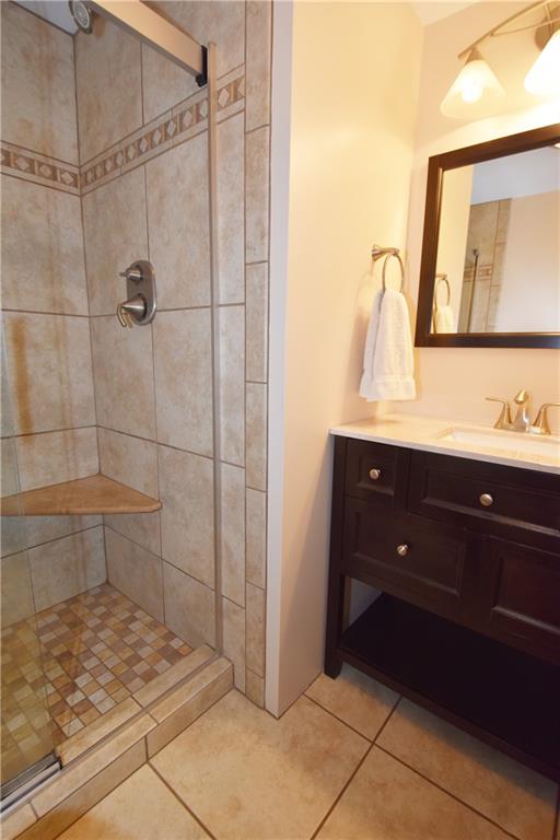 294 Old Farm Road Pittsburgh, PA 15228 - Photo 14 of 25 a bathroom with a sink and a mirror