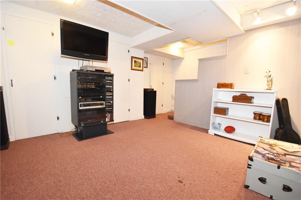294 Old Farm Road Pittsburgh, PA 15228 - Photo 20 of 25 a view of living room with furniture and flat screen tv