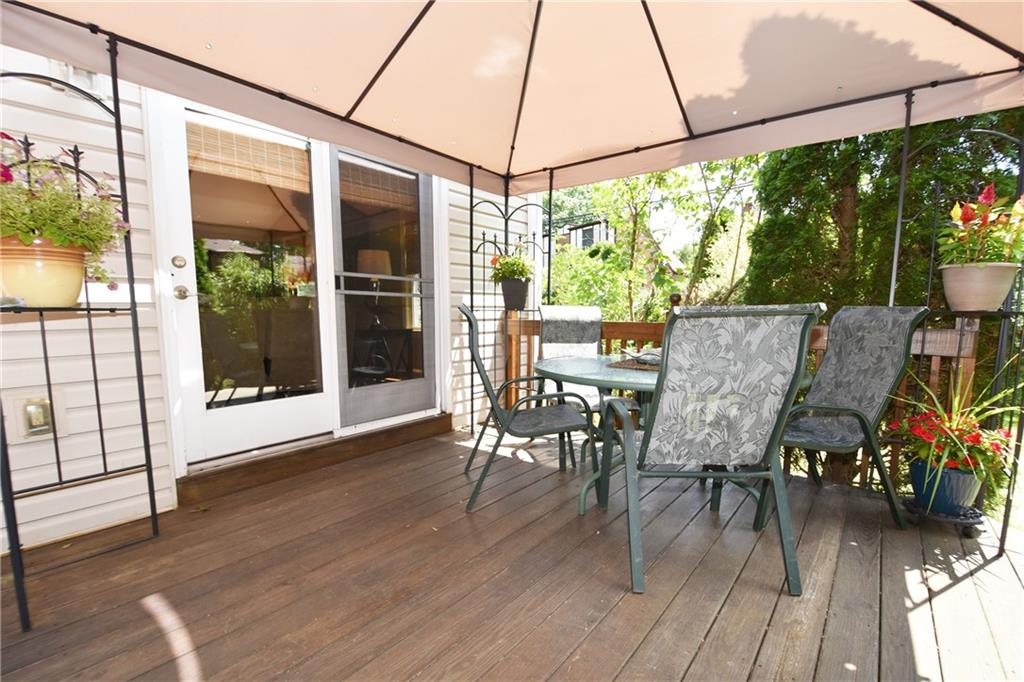 294 Old Farm Road Pittsburgh, PA 15228 - Photo 22 of 25 a view of a patio with a table and chairs
