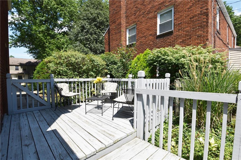 294 Old Farm Road Pittsburgh, PA 15228 - Photo 23 of 25 a view of a chairs and table on the wooden deck