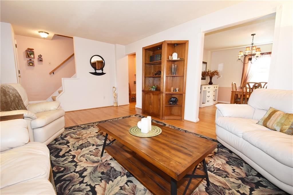 294 Old Farm Road Pittsburgh, PA 15228 - Photo 4 of 25 a living room with furniture and wooden floor