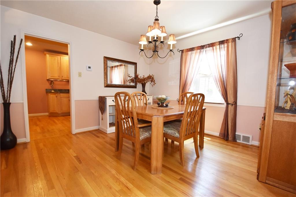 294 Old Farm Road Pittsburgh, PA 15228 - Photo 7 of 25 a view of a dining room with furniture window and wooden floor