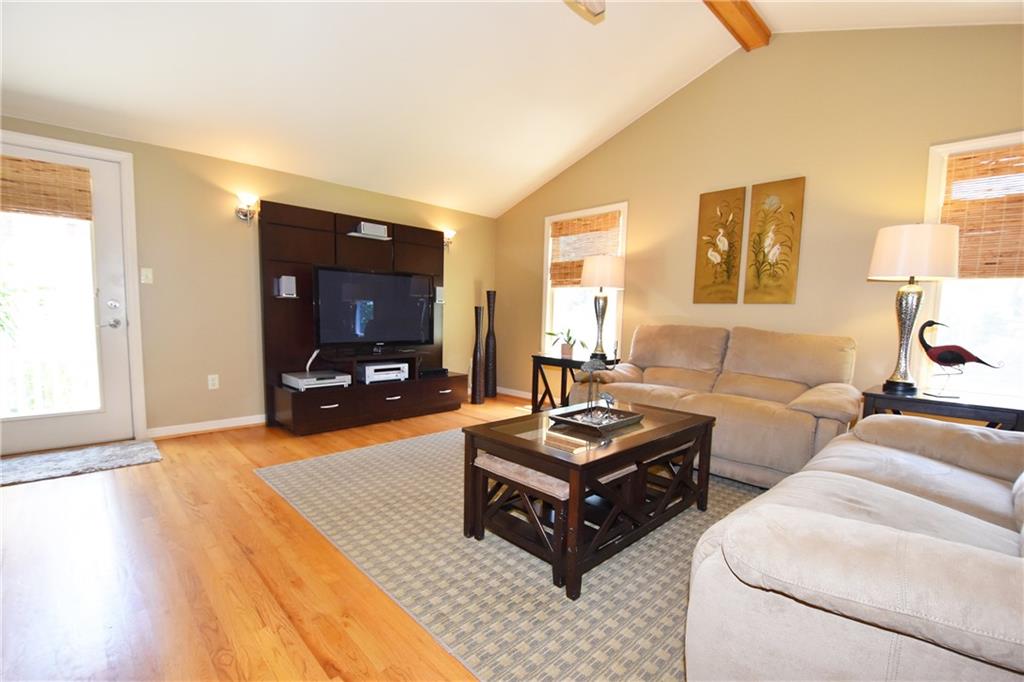 294 Old Farm Road Pittsburgh, PA 15228 - Photo 10 of 25 a living room with furniture and a wooden floor