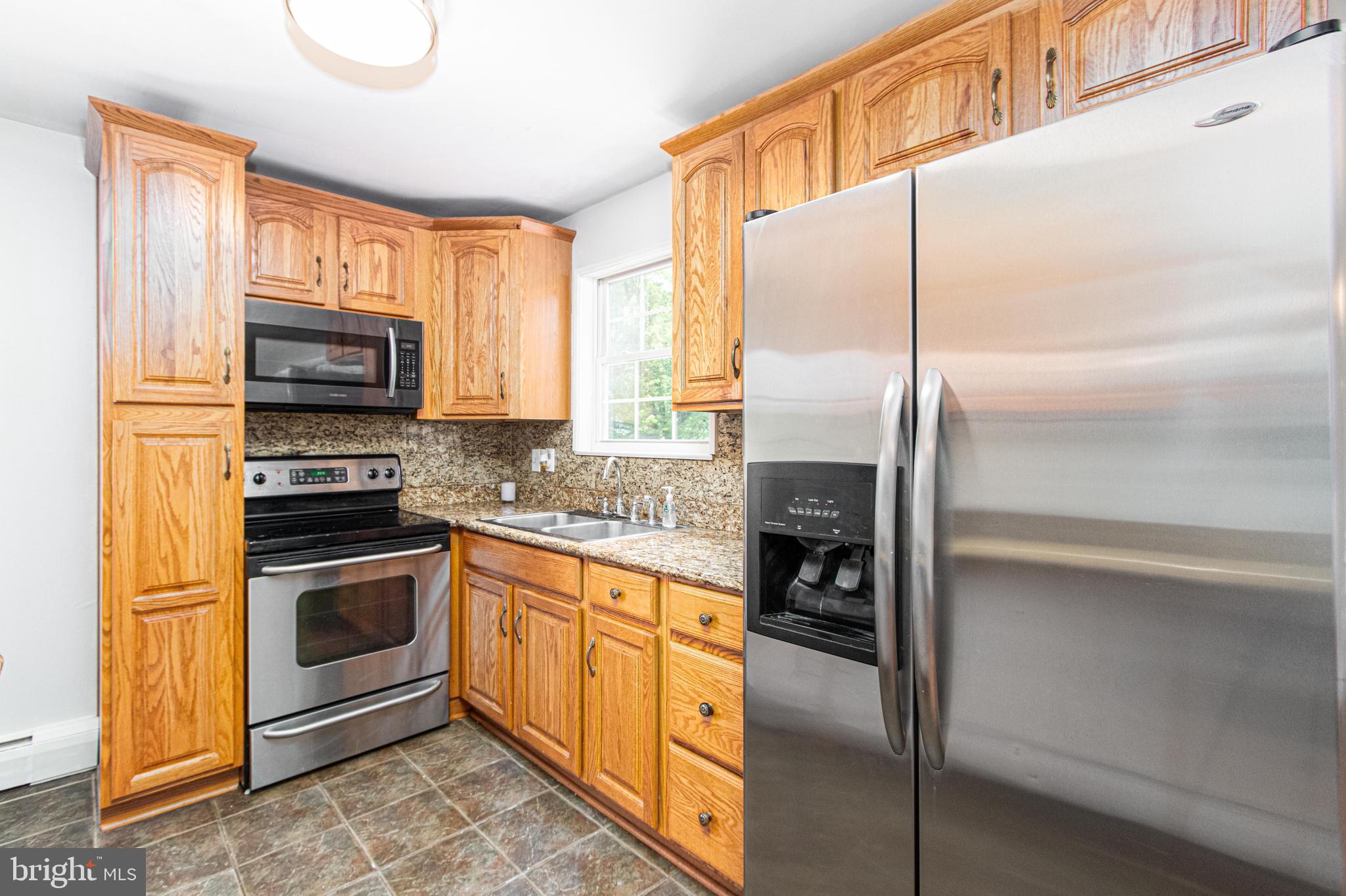 1500 Ross Road Bel Air, MD 21014 - Photo 22 of 62 SS appliances & tiled floor in kitchen