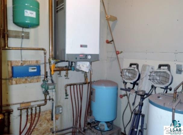 55799 Reykdal Road Ashland, WI 54806 - Photo 21 of 24 In-floor heat/pressure/hot water heater
