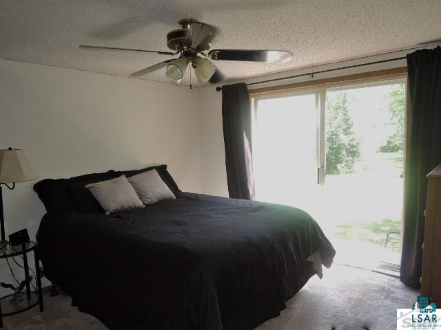 55799 Reykdal Road Ashland, WI 54806 - Photo 9 of 24 Master Bedroom with patio door