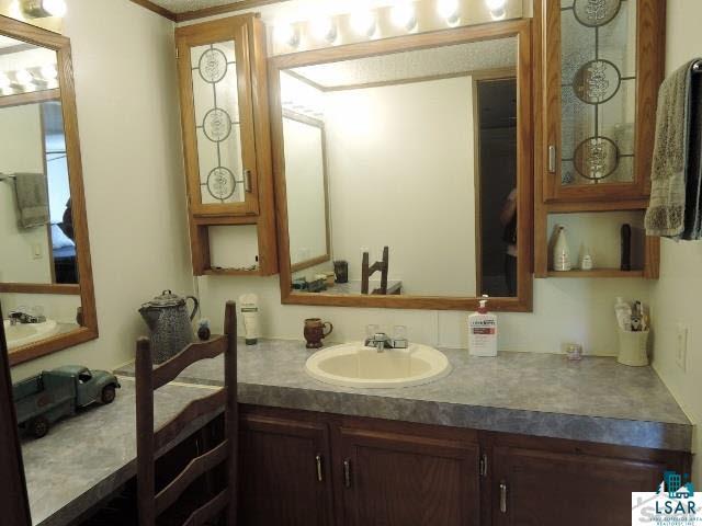 55799 Reykdal Road Ashland, WI 54806 - Photo 10 of 24 17X7 Master sink nook/jetted tub bathroom