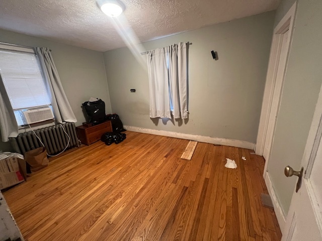 43 Marshall Avenue Naugatuck, CT 06770 - Photo 10 of 11 a room with wooden floor and furniture