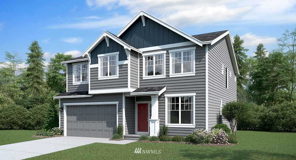 934 14th Avenue Sultan, WA 98294 - Photo 1 of 1 a front view of a house with a garden and plants