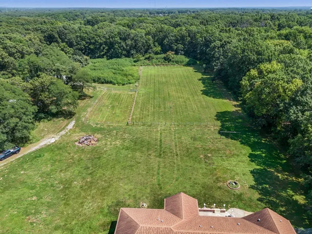 a view of a lake with a yard