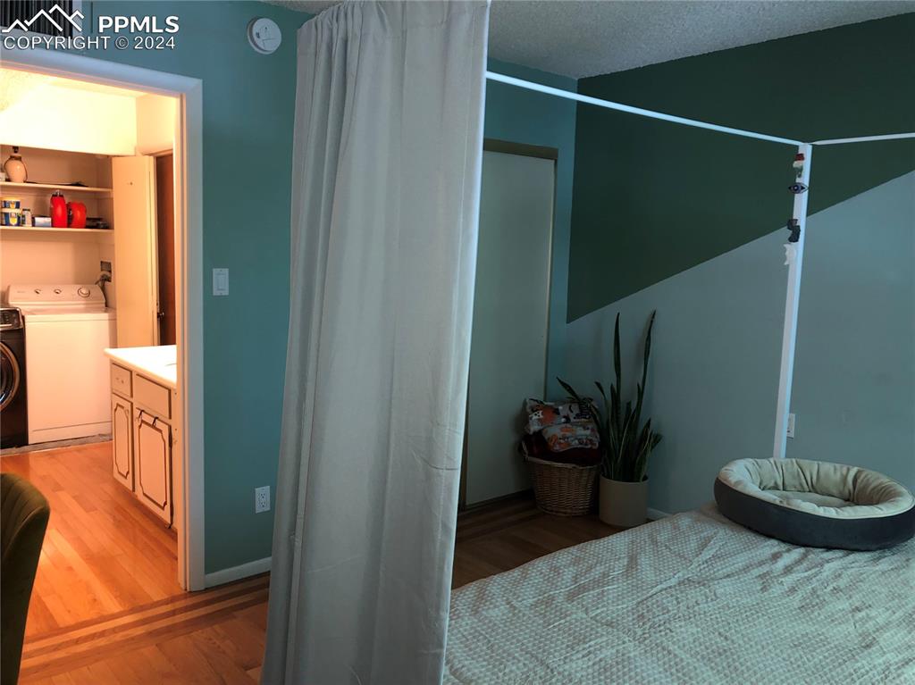 2953 Mesa Road, Unit B Colorado Springs, CO 80904 - Photo 7 of 17 a bathroom with a sink and a mirror