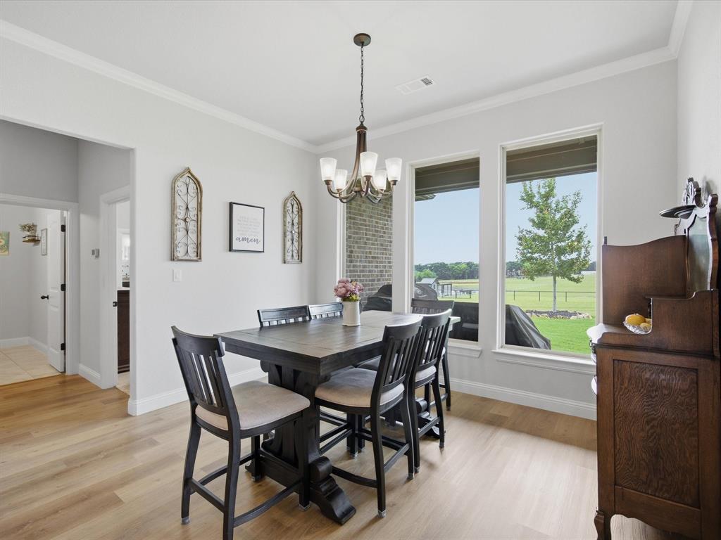 150 Quail Ridge Decatur, TX 76234 - Photo 15 of 32 a view of a dining room with furniture window and outside view