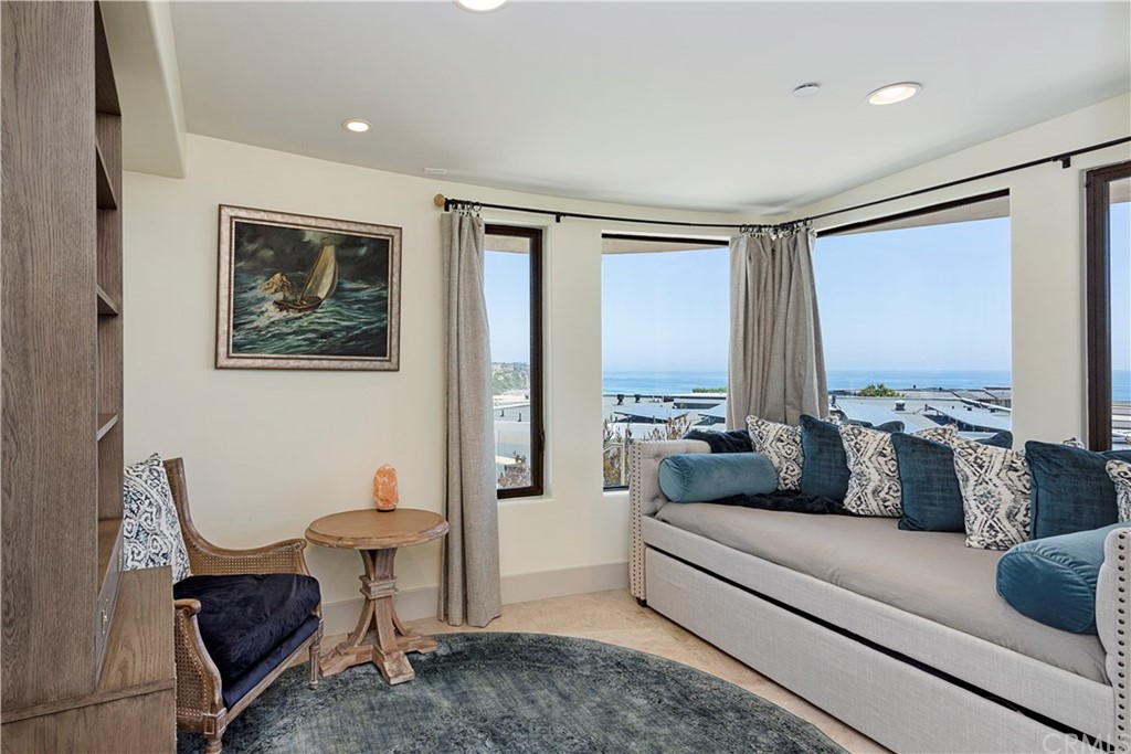 50 Monarch Bay Drive Dana Point, CA 92629 - Photo 24 of 34 a living room with furniture and a large window