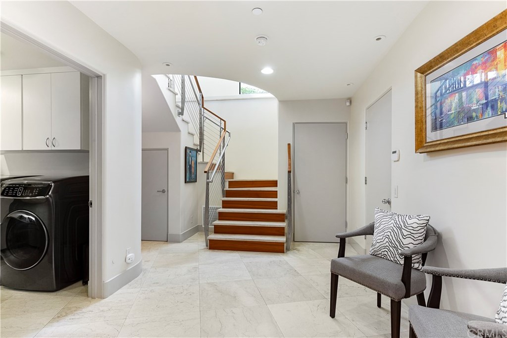 50 Monarch Bay Drive Dana Point, CA 92629 - Photo 26 of 34 a view of a livingroom with furniture and staircase