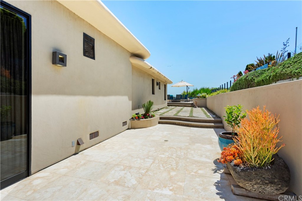 50 Monarch Bay Drive Dana Point, CA 92629 - Photo 30 of 34 a view of a house with a backyard