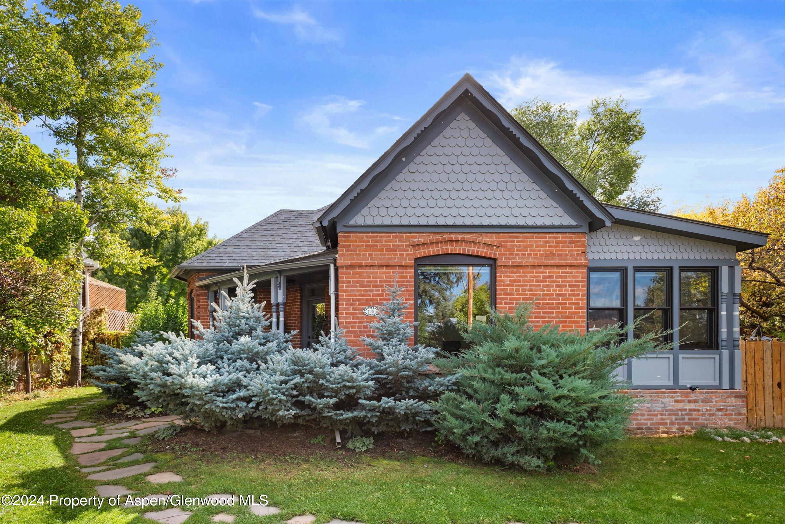 156 Garfield Avenue Carbondale, CO 81623 - Photo 2 of 24 a front view of a house with a yard