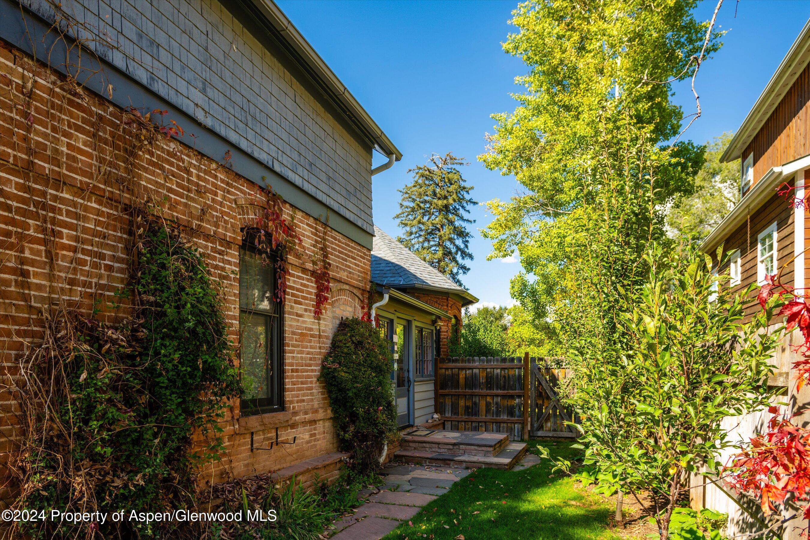 156 Garfield Avenue Carbondale, CO 81623 - Photo 21 of 24 a view of house with a garden