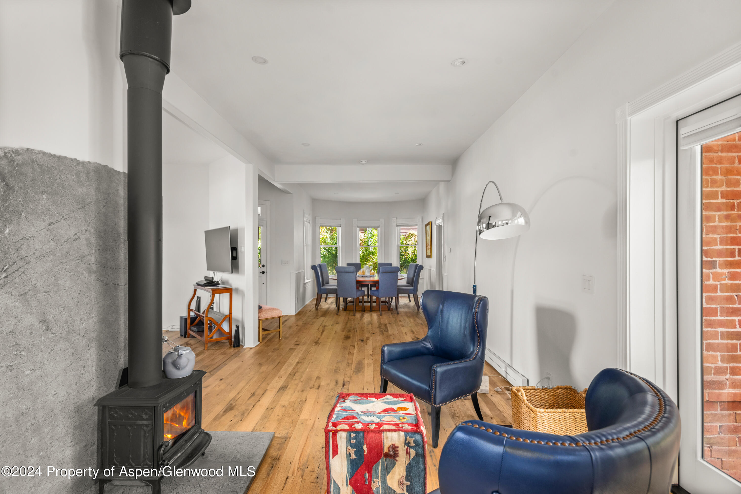 156 Garfield Avenue Carbondale, CO 81623 - Photo 3 of 24 a living room with furniture and a wooden floor