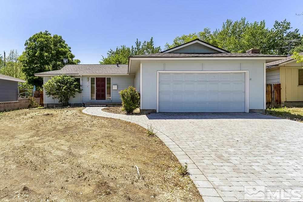 1531 Rayburn Drive Reno, NV 89503 - Photo 1 of 26 front view of a house with a yard