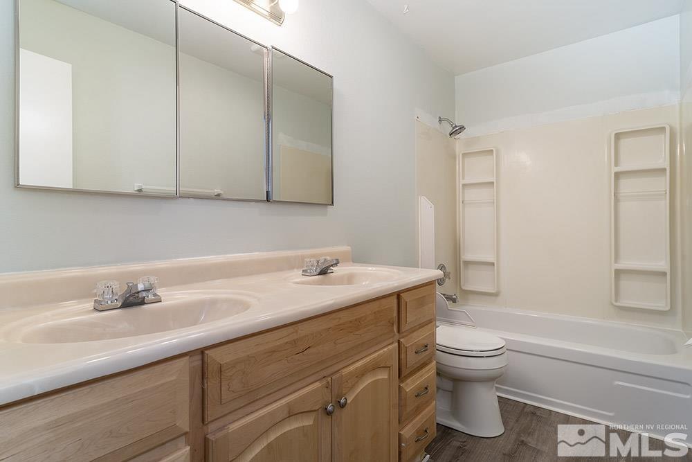 1531 Rayburn Drive Reno, NV 89503 - Photo 13 of 26 a bathroom with a sink toilet and vanity