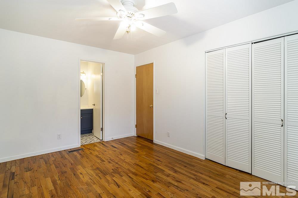 1531 Rayburn Drive Reno, NV 89503 - Photo 15 of 26 a view of empty room with wooden floor