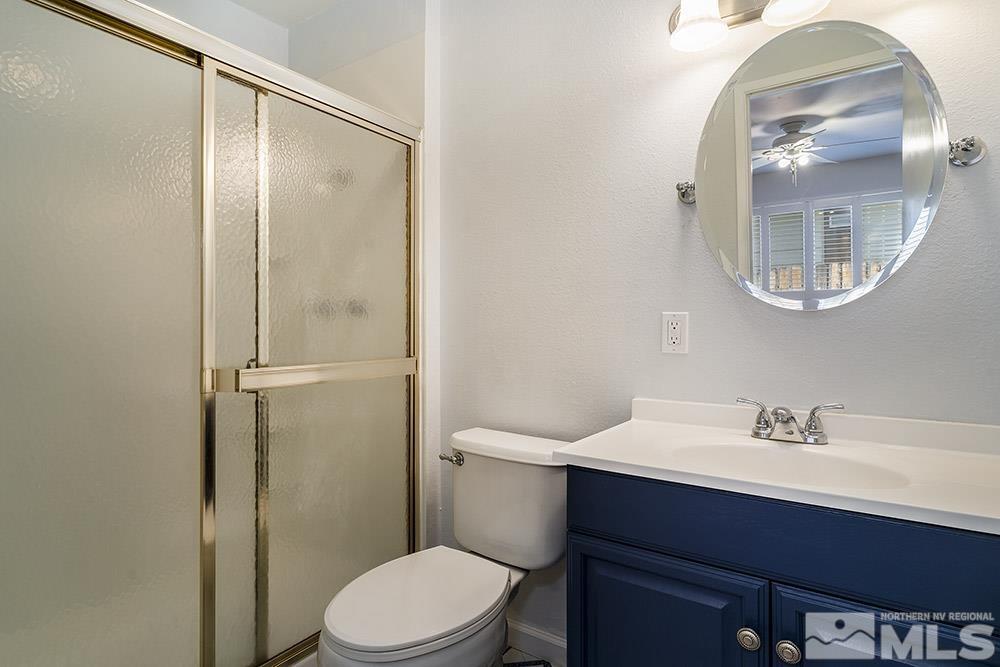 1531 Rayburn Drive Reno, NV 89503 - Photo 17 of 26 a bathroom with a sink a toilet and shower