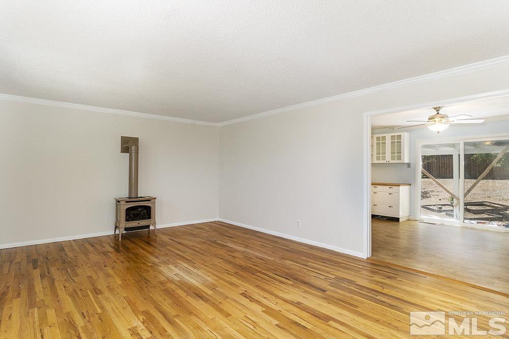 1531 Rayburn Drive Reno, NV 89503 - Photo 2 of 26 a view of a livingroom with wooden floor and a rug