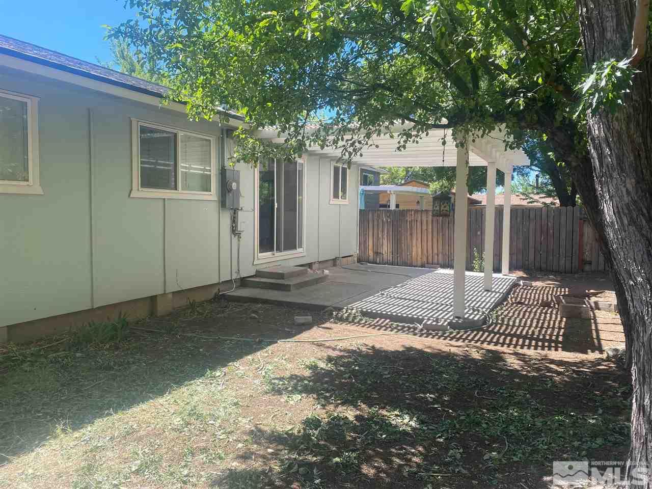1531 Rayburn Drive Reno, NV 89503 - Photo 24 of 26 a front view of a house having yard