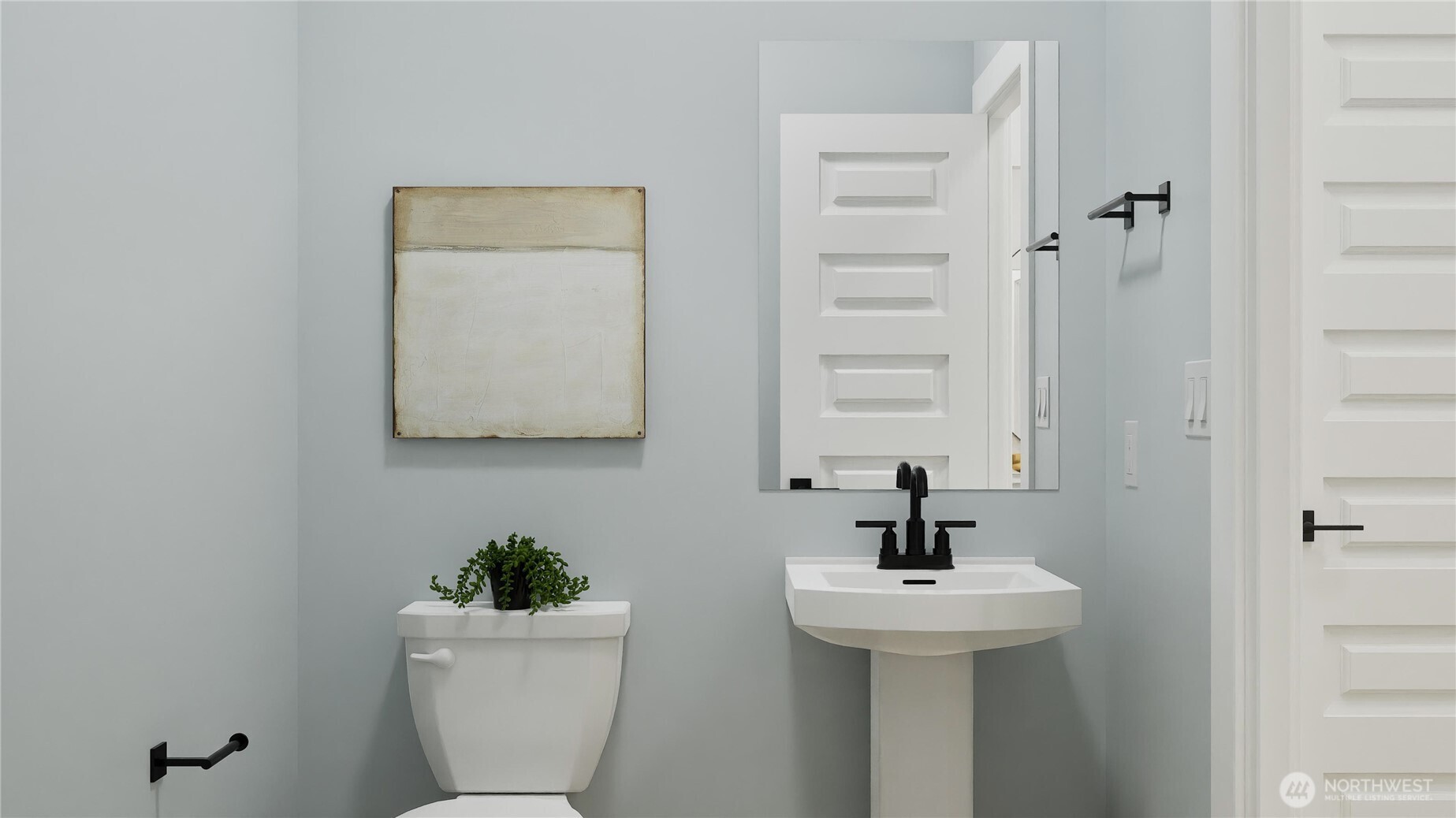 970 Folgate Drive Sequim, WA 98382 - Photo 15 of 21 a bathroom with a sink a toilet and mirror