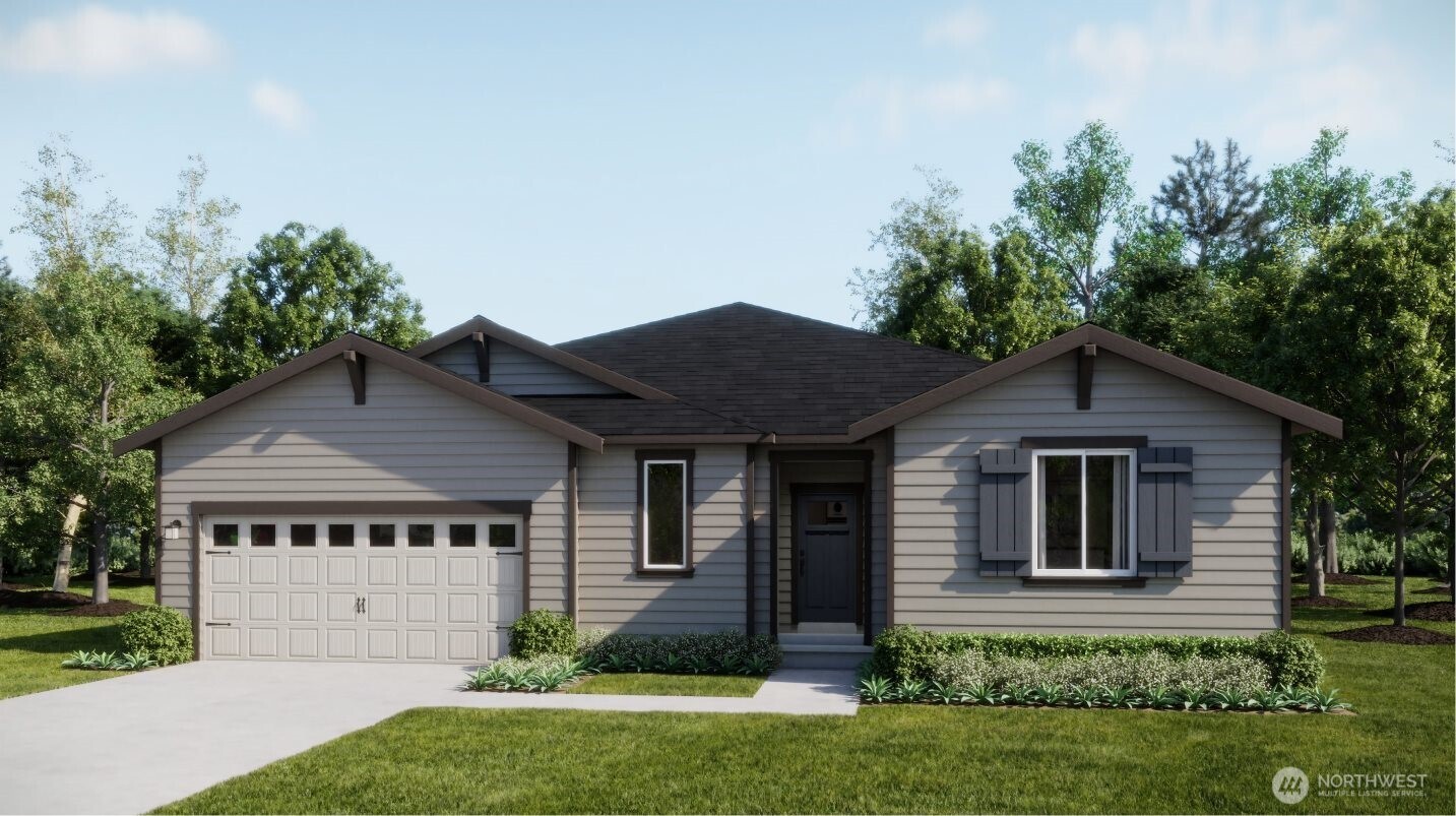 970 Folgate Drive Sequim, WA 98382 - Photo 2 of 21 a front view of a house with a garden