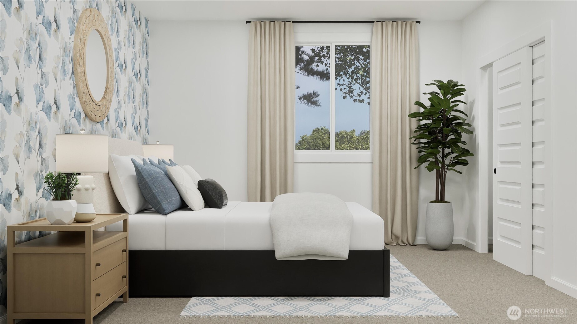 970 Folgate Drive Sequim, WA 98382 - Photo 21 of 21 a bedroom with a large bed and a potted plant