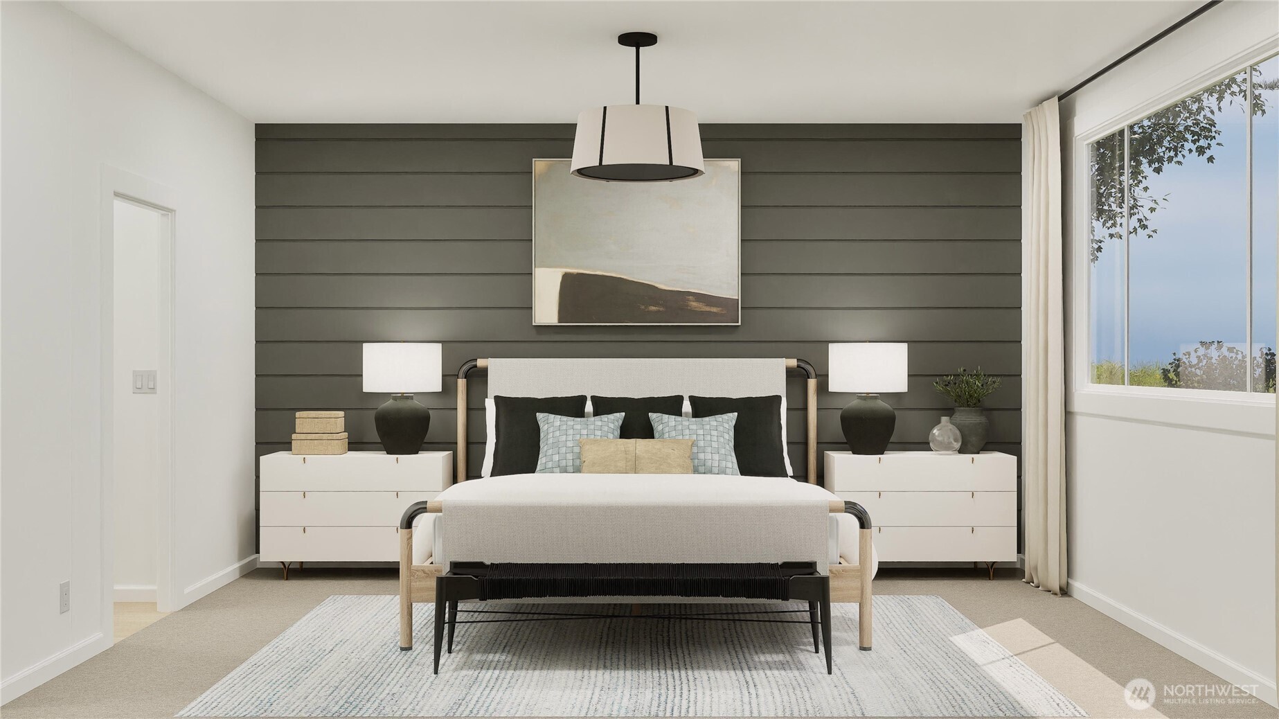 970 Folgate Drive Sequim, WA 98382 - Photo 9 of 21 a bedroom with a large bed and a chandelier