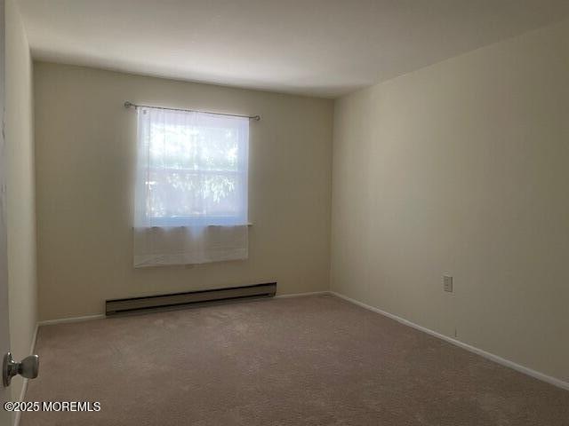 21 A Homestead Whiting, NJ 08759 - Photo 12 of 19 an empty room with a window