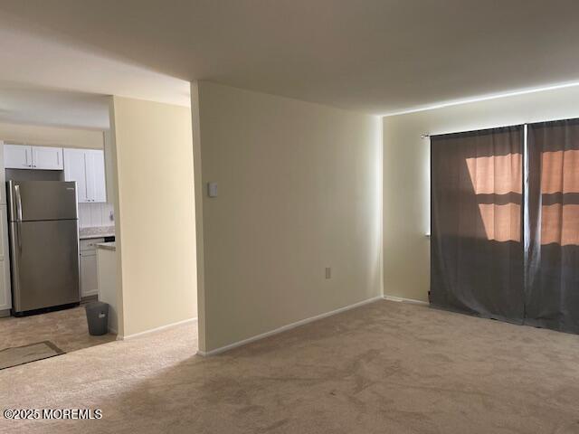 21 A Homestead Whiting, NJ 08759 - Photo 9 of 19 a view of an empty room with a window