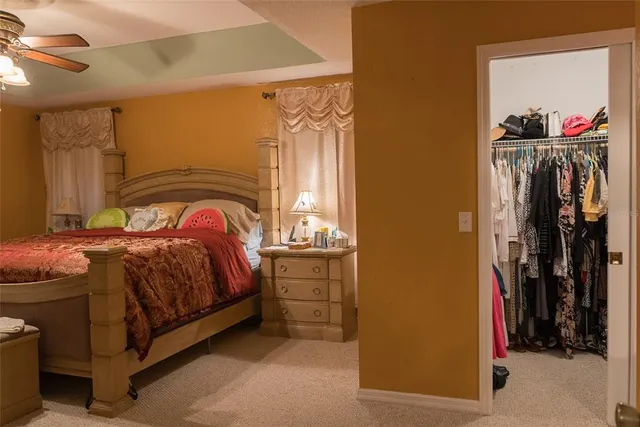 a room with furniture and musical instruments