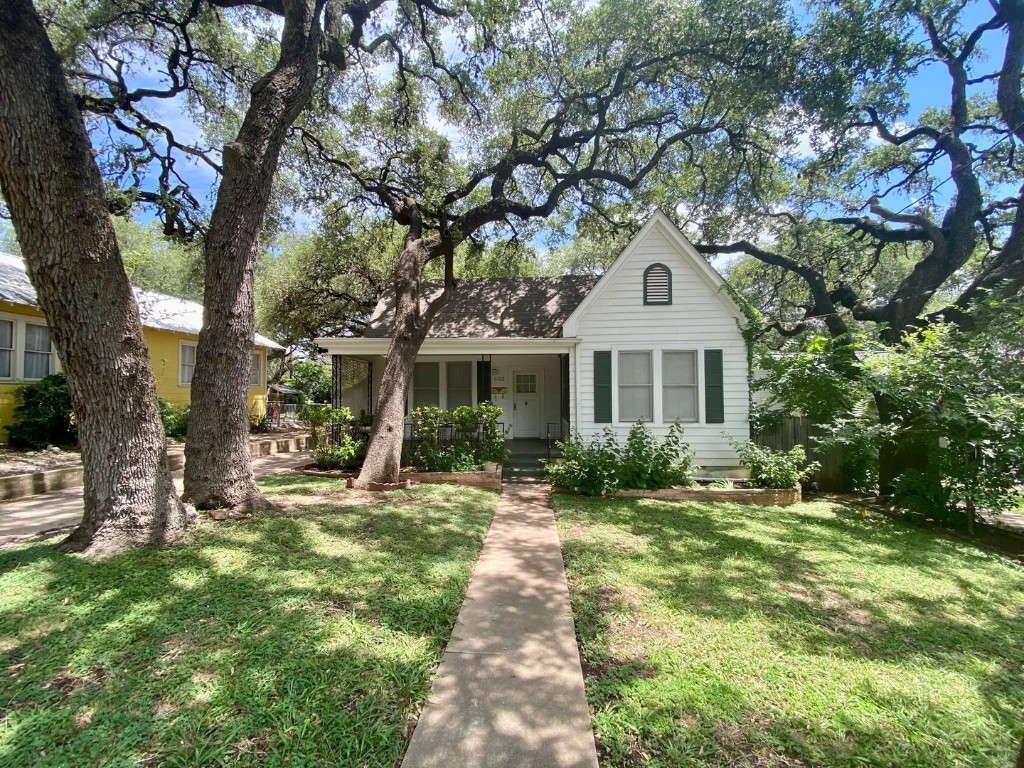 502 Academy Drive Austin, TX 78704 - Photo 1 of 1 a front view of a house with a yard
