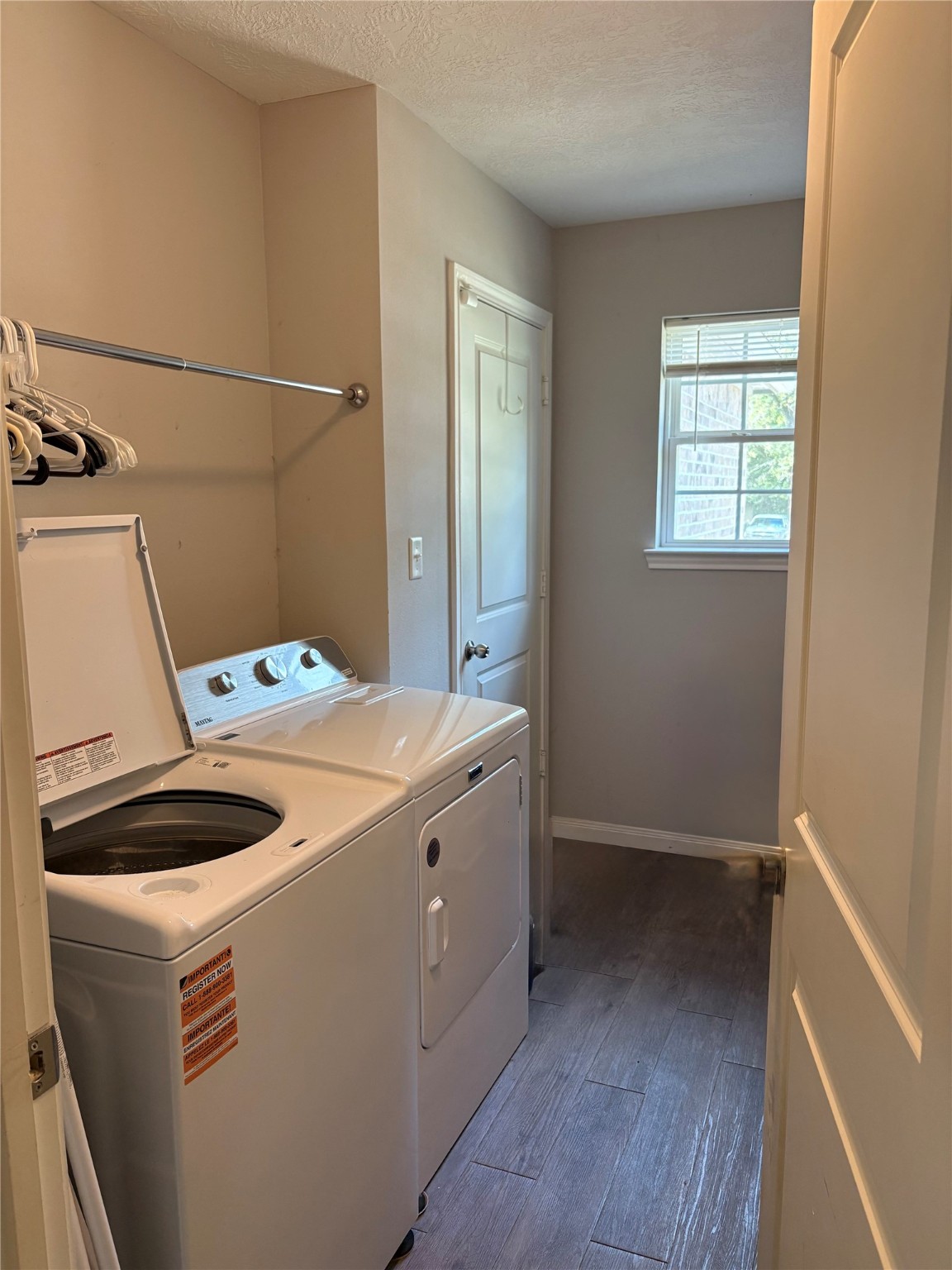 3940 Frontier Road Willis, TX 77378 - Photo 11 of 13 a utility room with dryer and washer