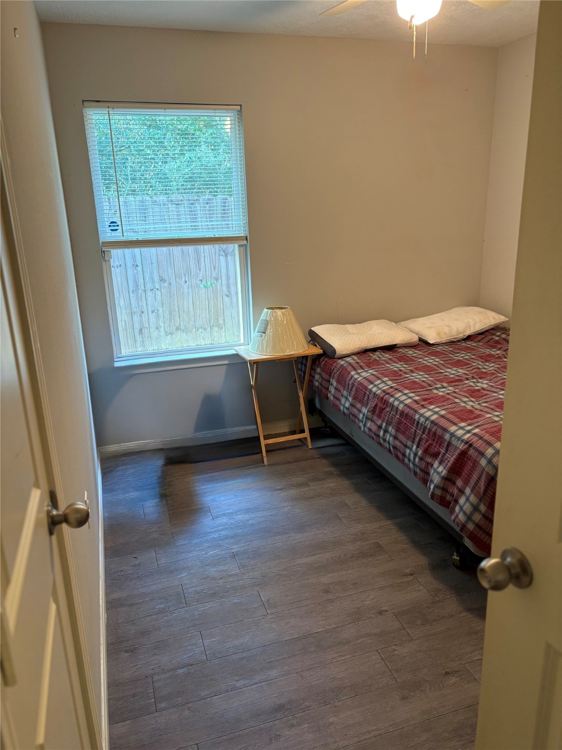 3940 Frontier Road Willis, TX 77378 - Photo 10 of 13 a spacious bedroom with a bed and a window