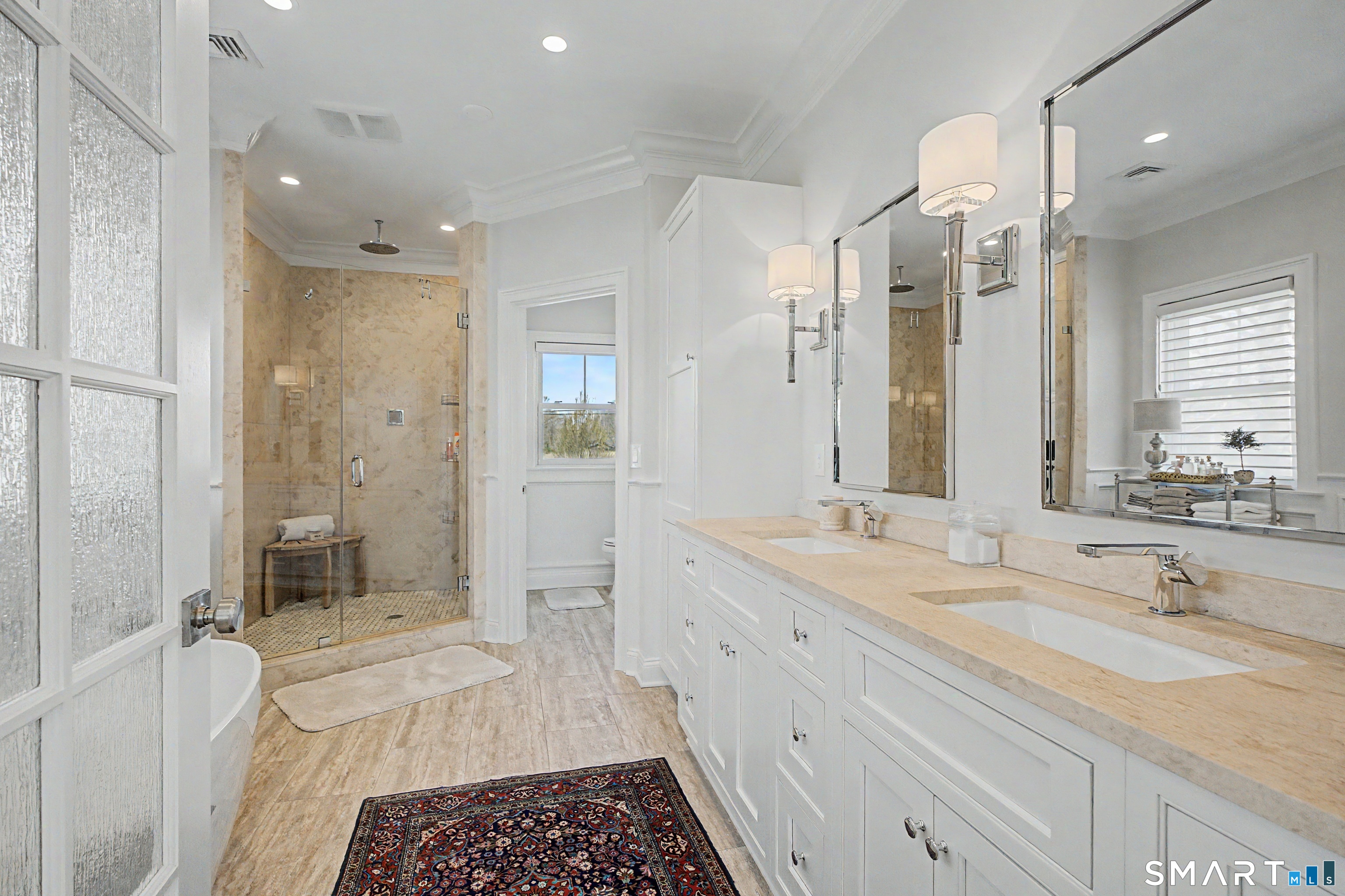 101 Garnet Park Road Madison, CT 06443 - Photo 21 of 40 a bathroom with a sink double vanity granite tub shower and a mirror